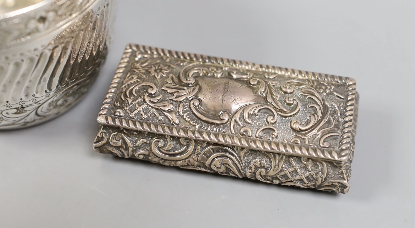 A late Victorian silver sugar bowl, London, 1897, diameter 90mm, a late Victorian silver trinket box and a Dutch white metal circular pill box.